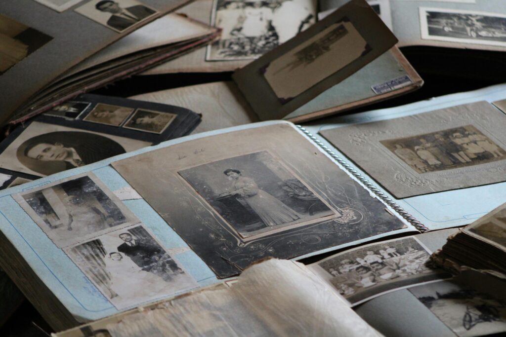 Old pictures and photo albums. Photo by Thiago José Amaral: https://www.pexels.com/photo/old-pictures-on-photo-album-6274899/